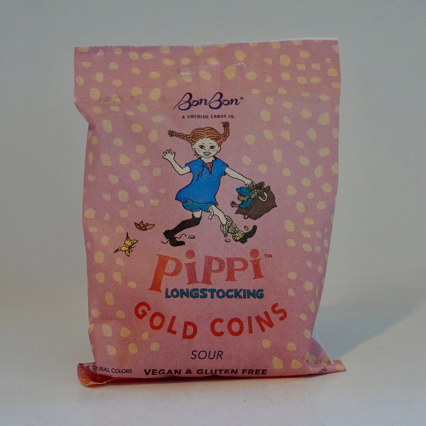 Pink bag of Pippi Longstocking Gold Coins on a white background