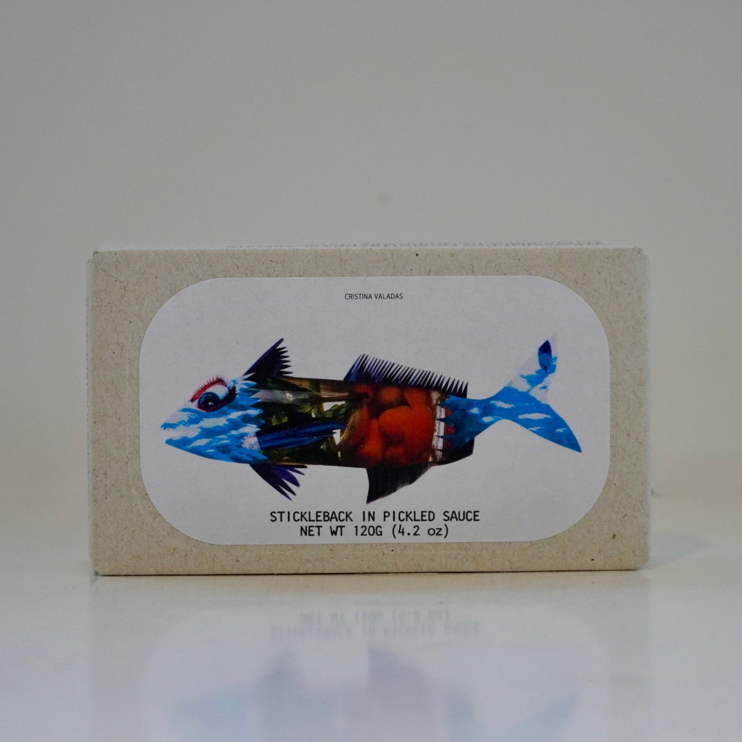 Tinned fish container with stickleback fish illustration on a white background