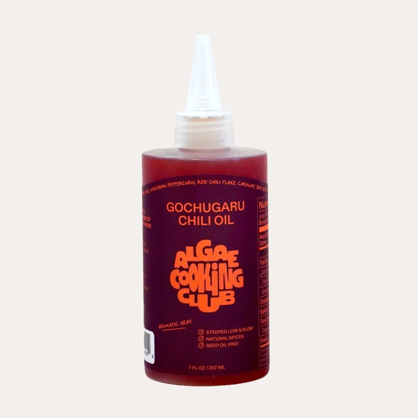 Bottle of Gochugaru Chili Oil from Algae Cooling Club on a white background