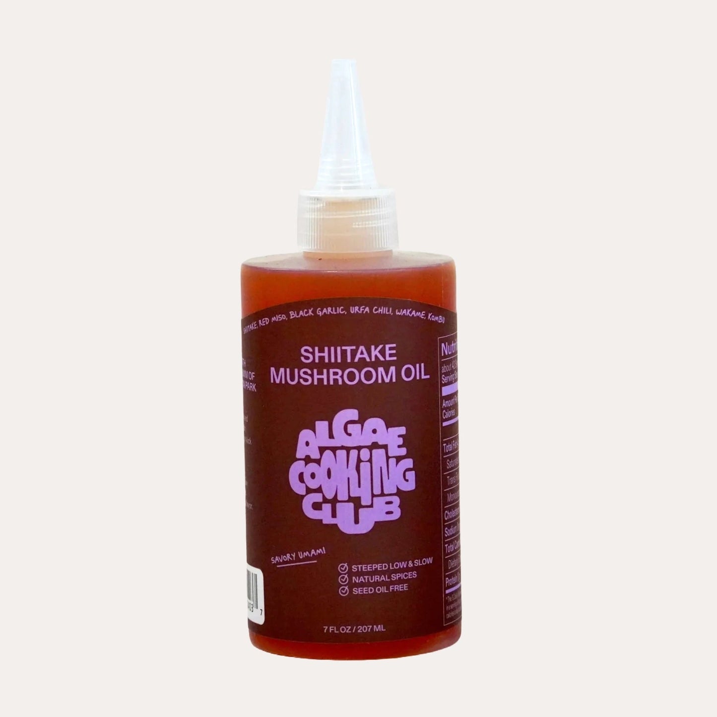 Bottle of Shiitake Mushroom Oil from Algae Cooking Club on a white background