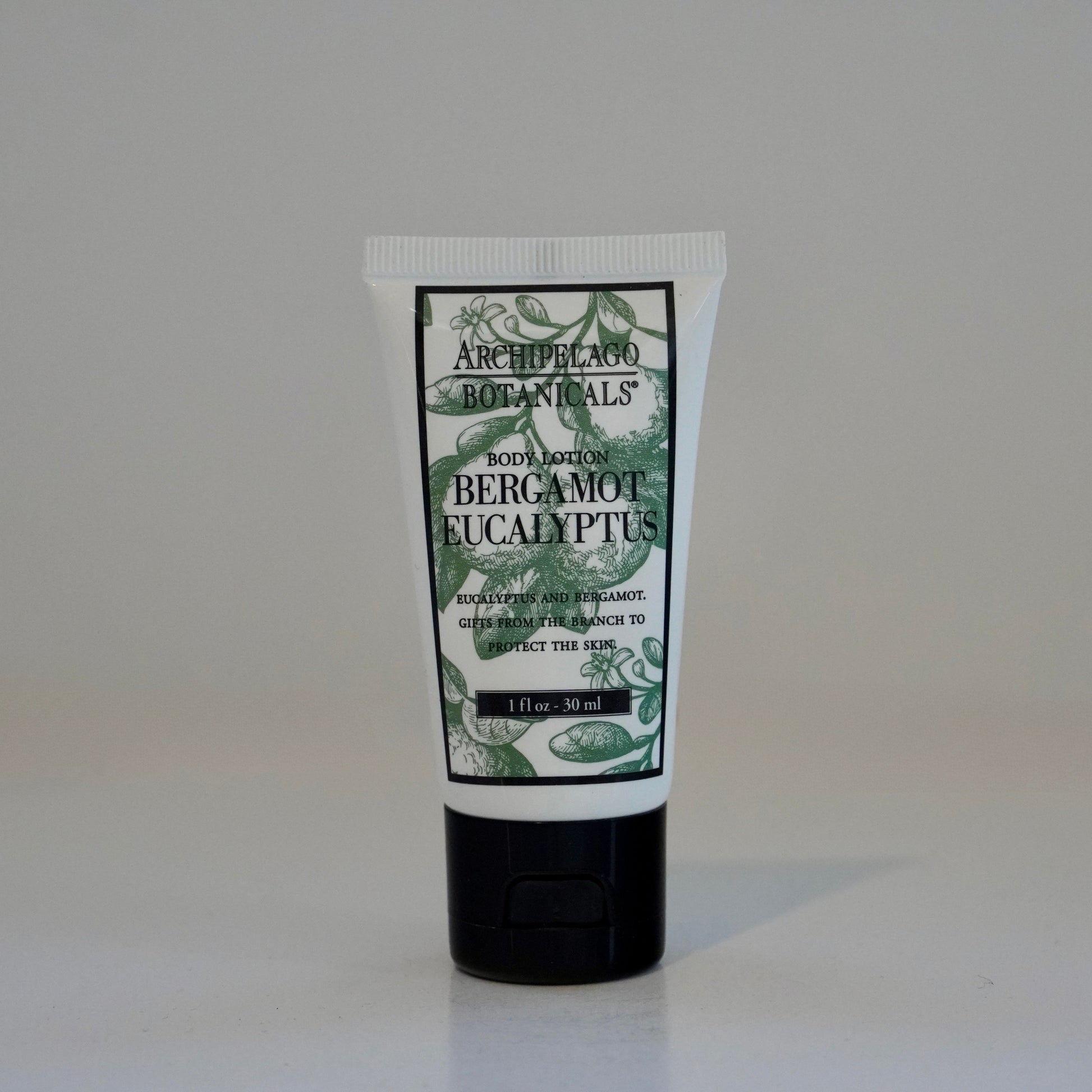 Tube of bergamot eucalyptus product on a white background