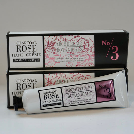 Archipelago Botanicals Charcoal Rose Hand Creme with packaging on a white background
