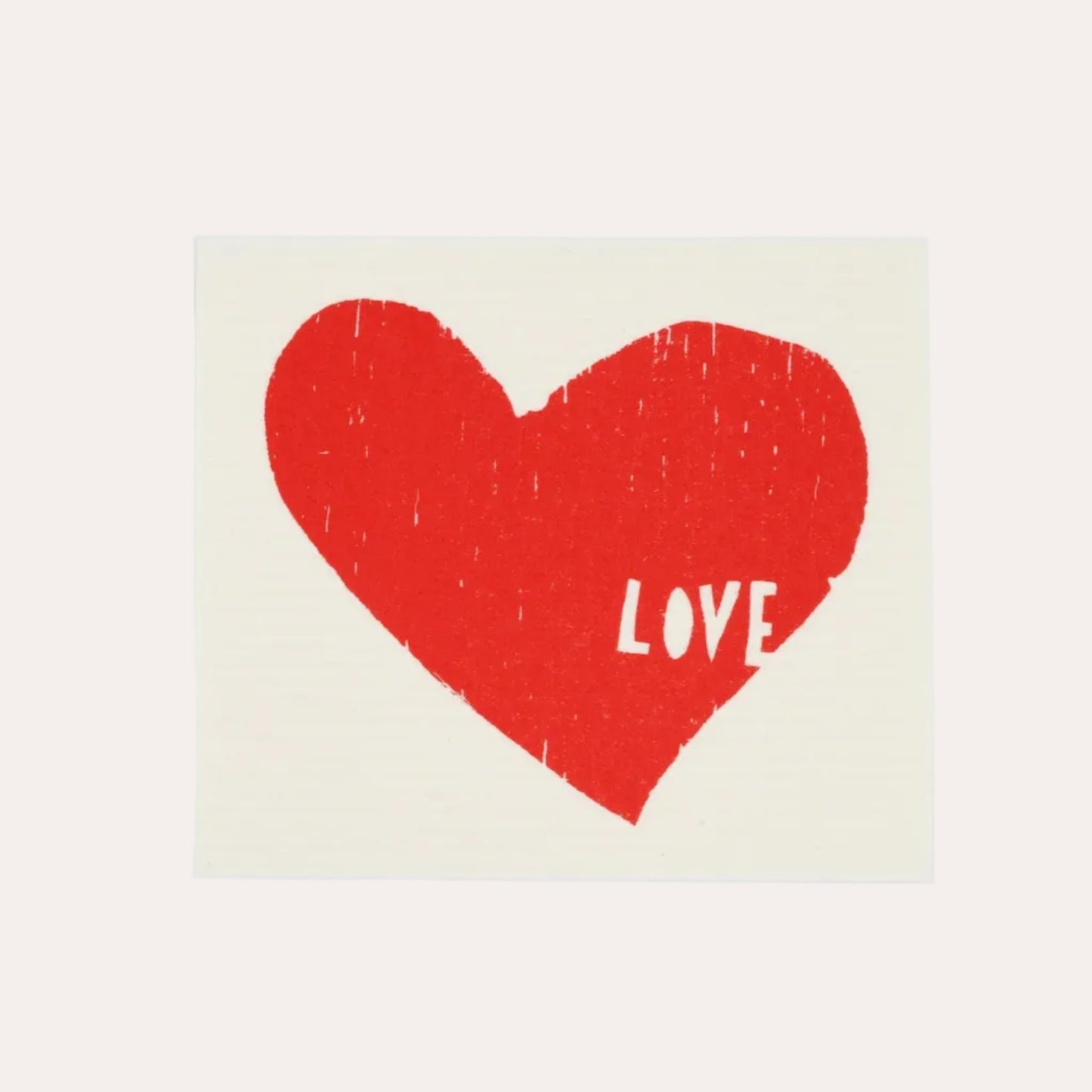 Red heart with 'LOVE' text on a beige background