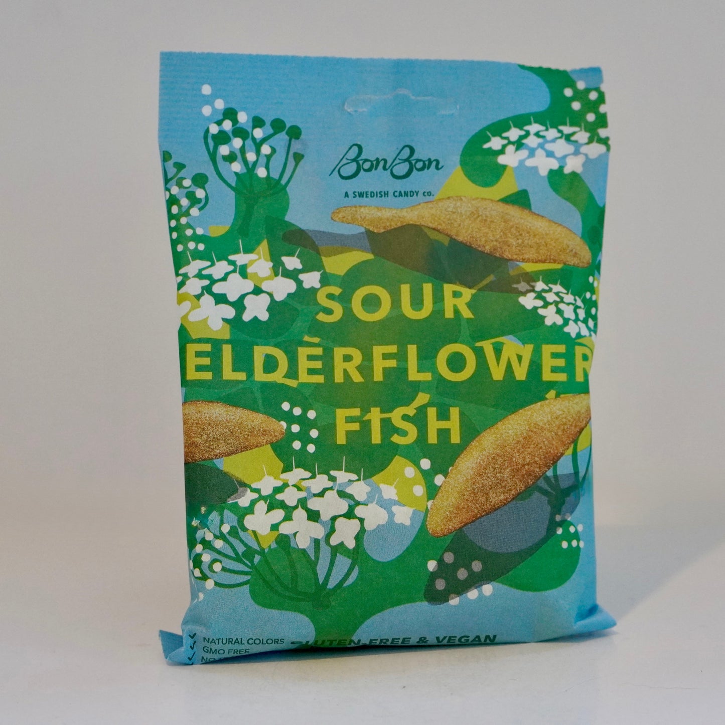 Packaged snack with 'Sour Elderflower Fish' text on a white background