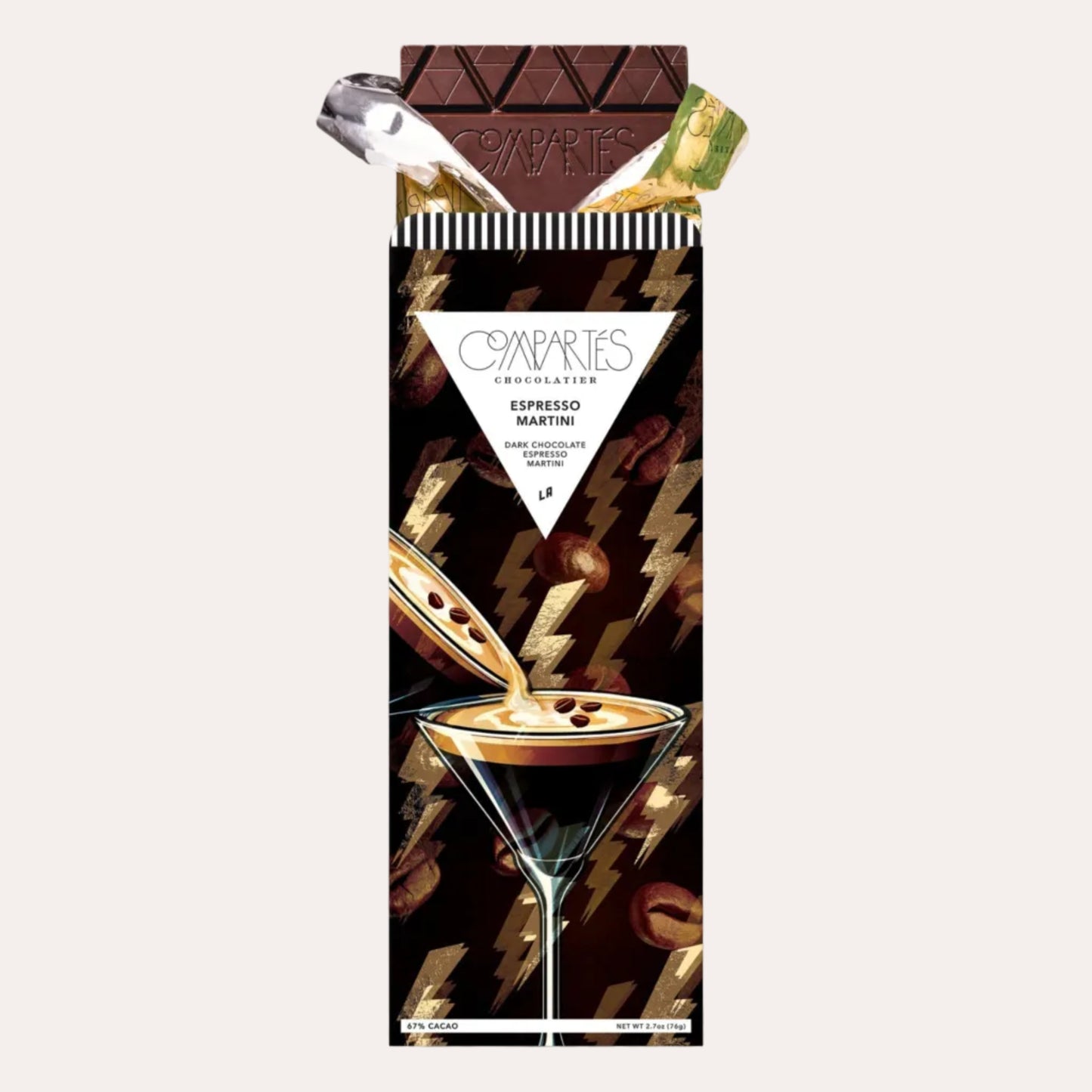 Chocolate bar with a packaging design featuring a martini glass and chocolate bar, branded 'Compartes'.