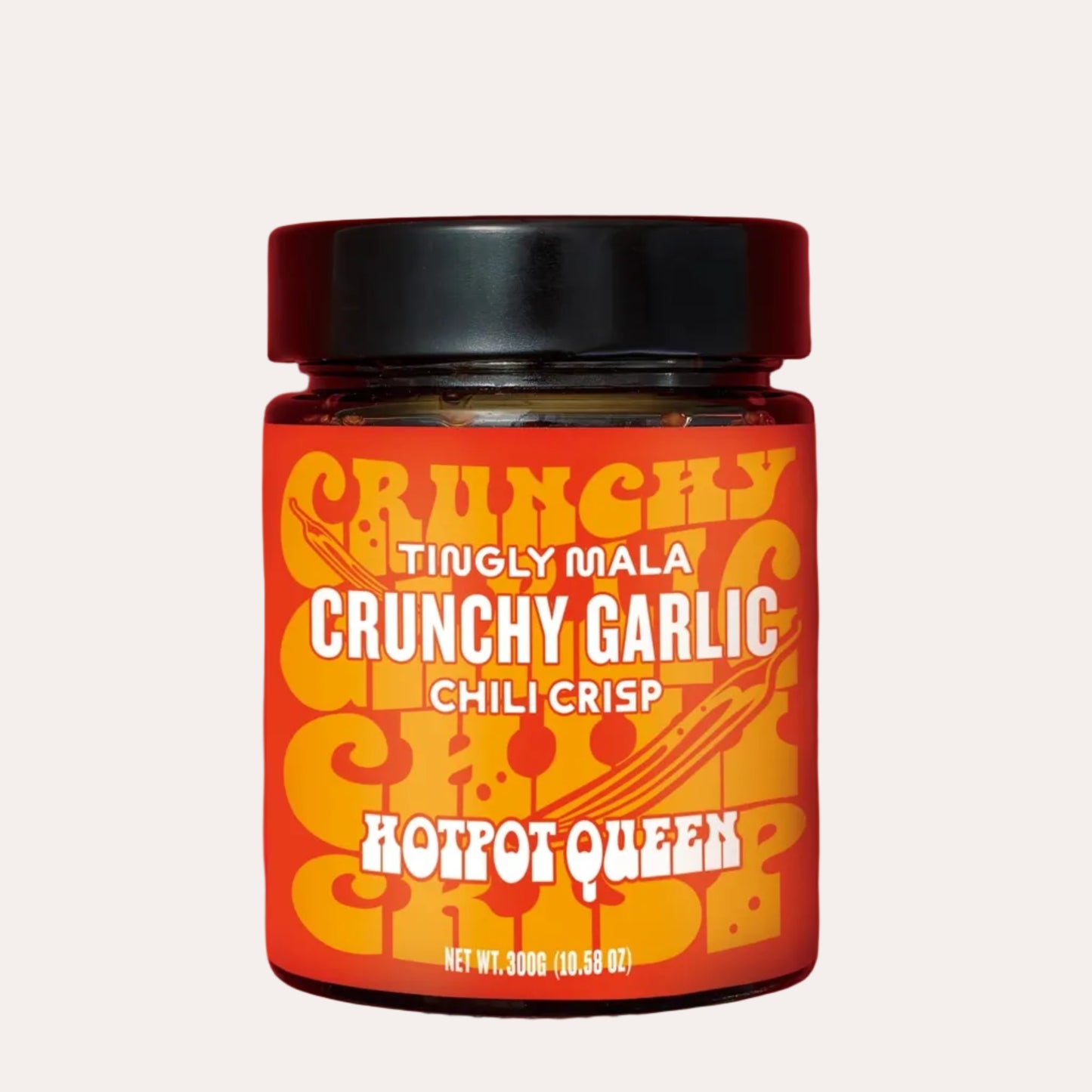 Jar of Crunchy Garlic Chili Crisp on a red background