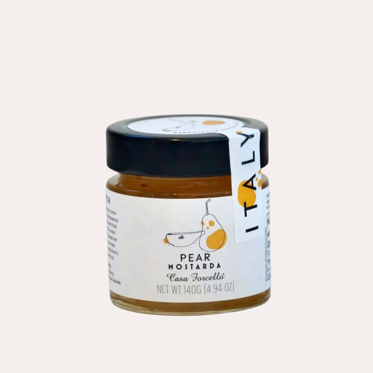 Jar of pear mustard with a black lid on a white background