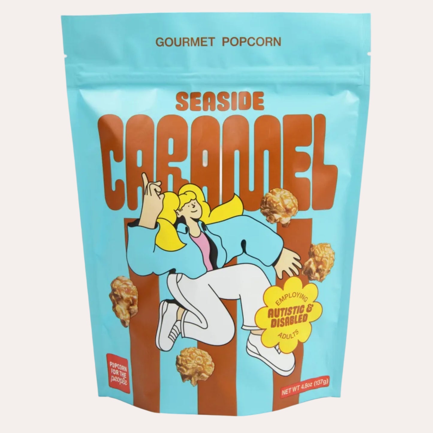 Gourmet popcorn package with cartoon character and text on a white background