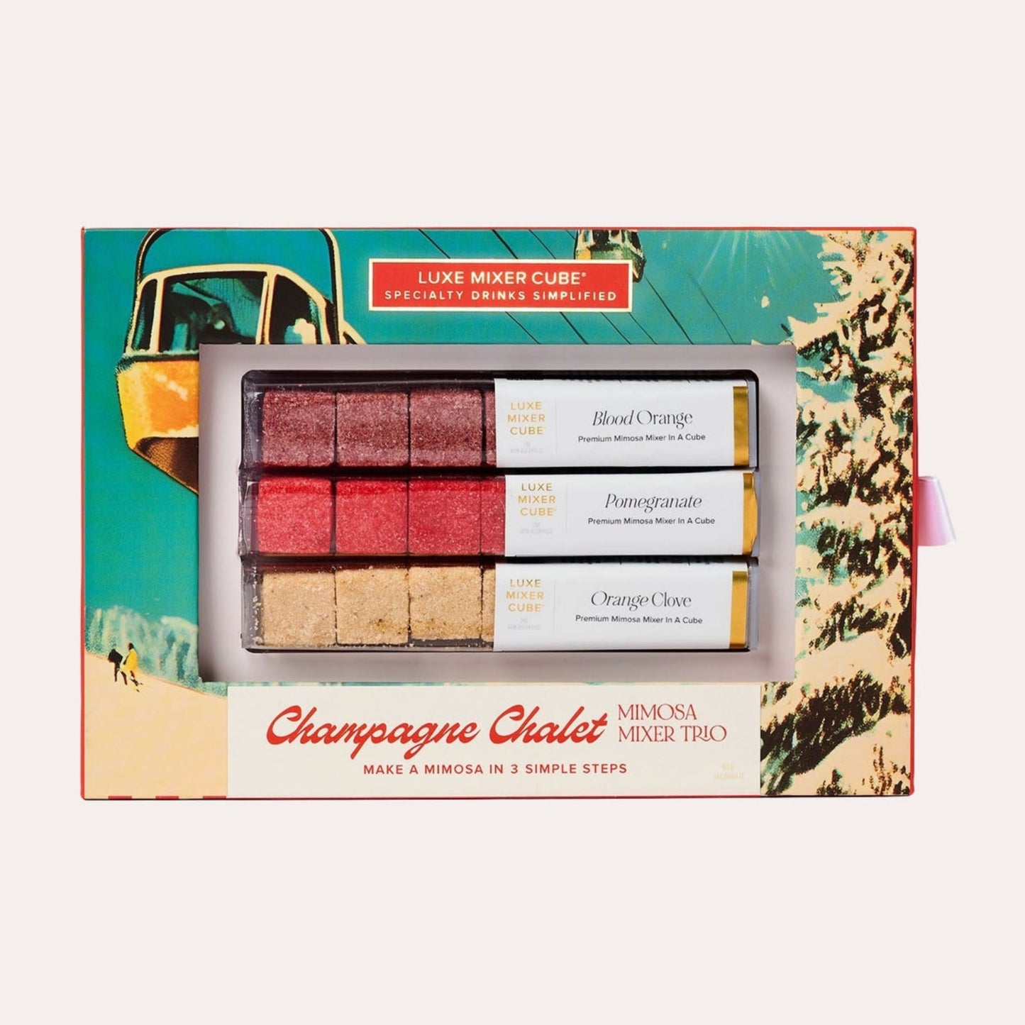 Champagne Chalet mixer cube set in a decorative box with a scenic design.