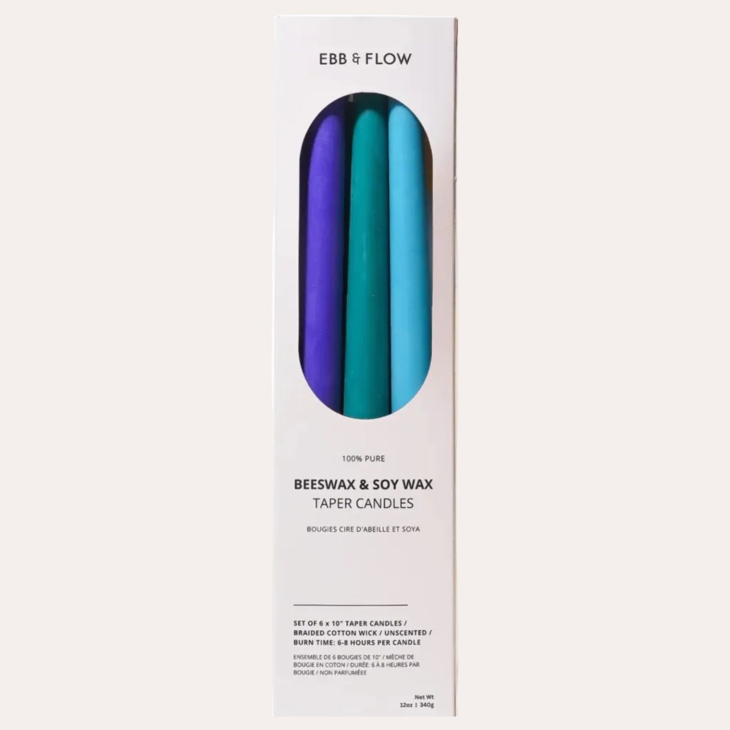 Box of Ebb & Flow candles with a blue and purple design on a white background