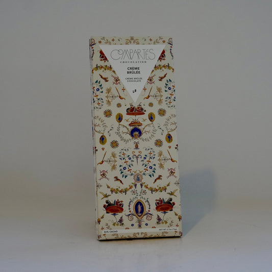 Decorative box with intricate designs on a white background