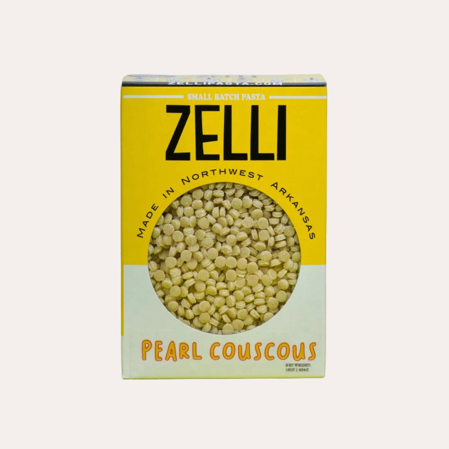 Box of Zelli pearl couscous on a light yellow background