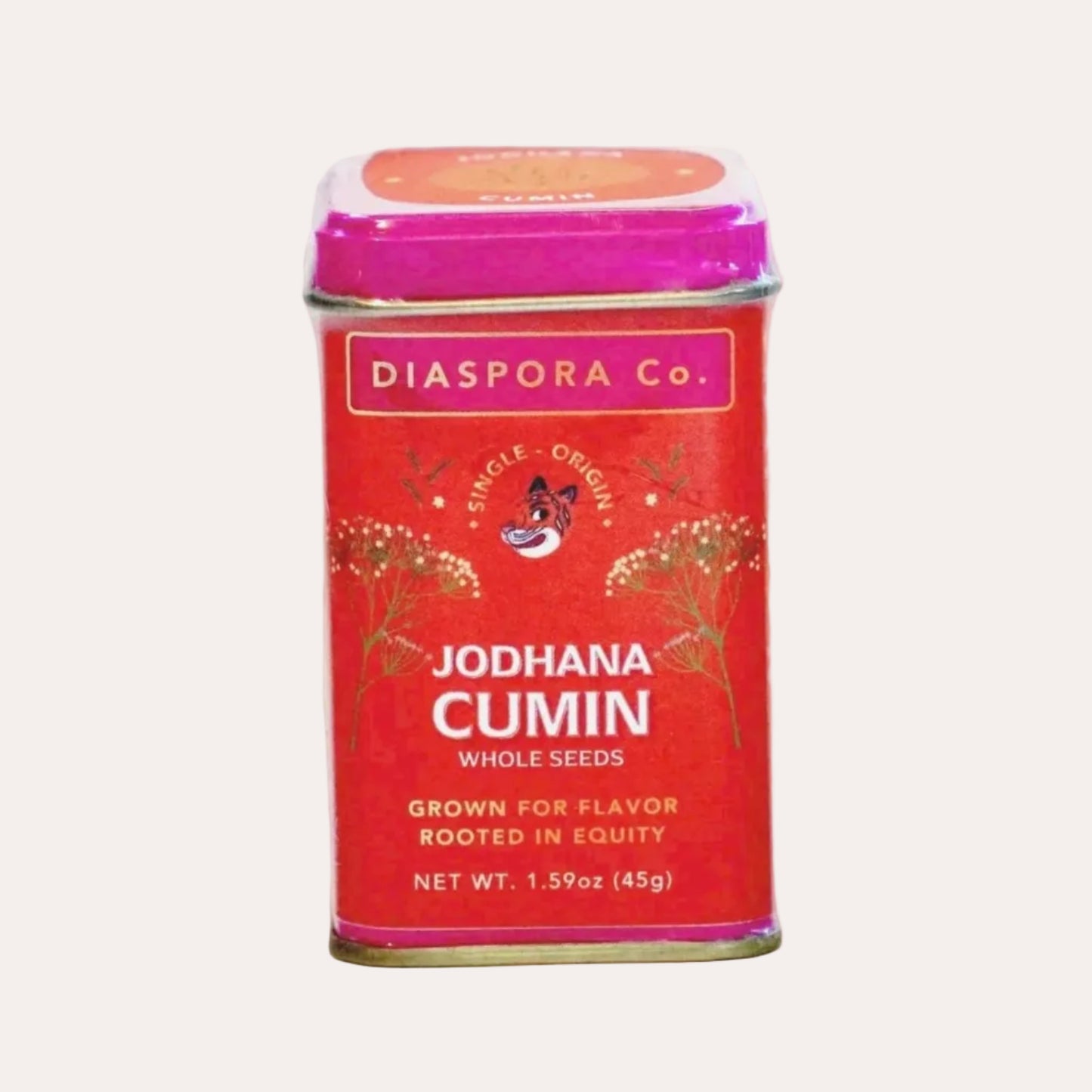 Red tin of Diaspora Co. Jodhana Cumin on a white background