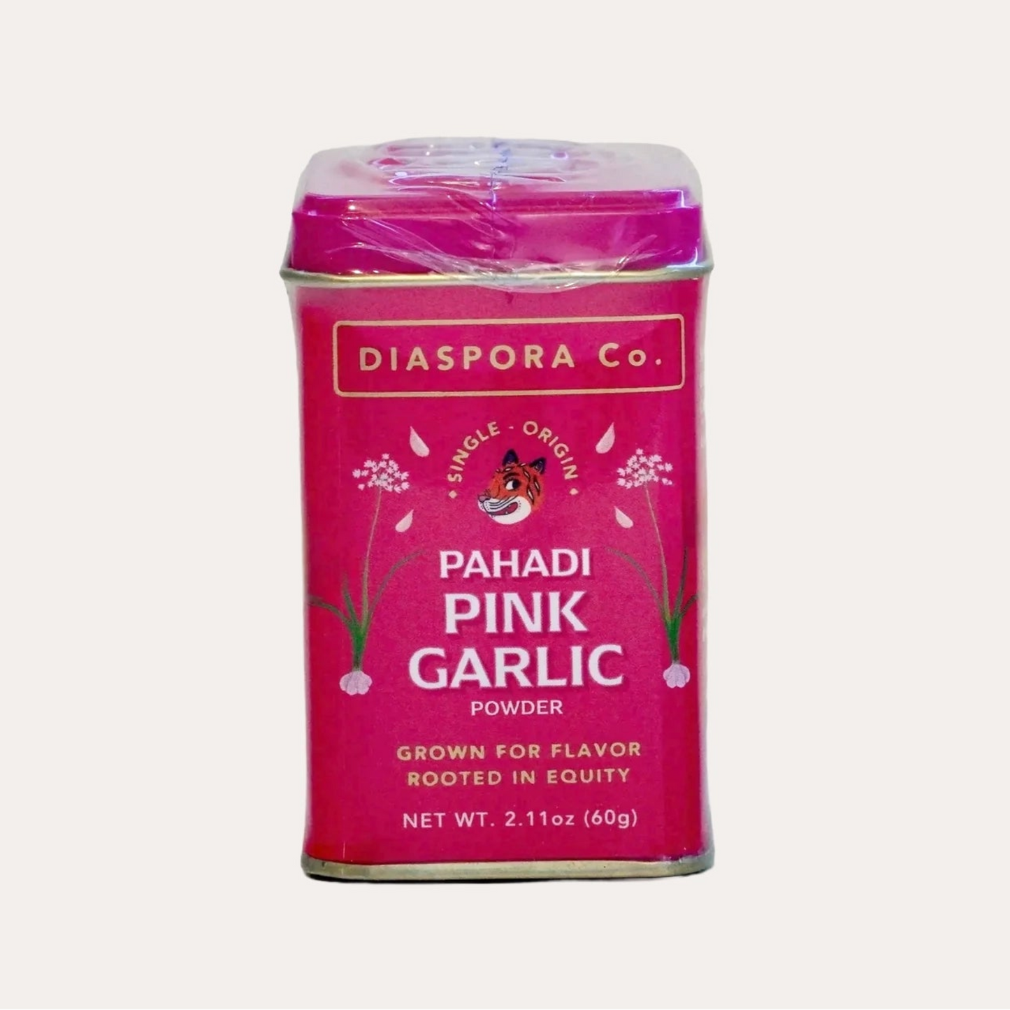 Pink canister of Diaspora Co. Pahadi Pink Garlic Powder on a white background