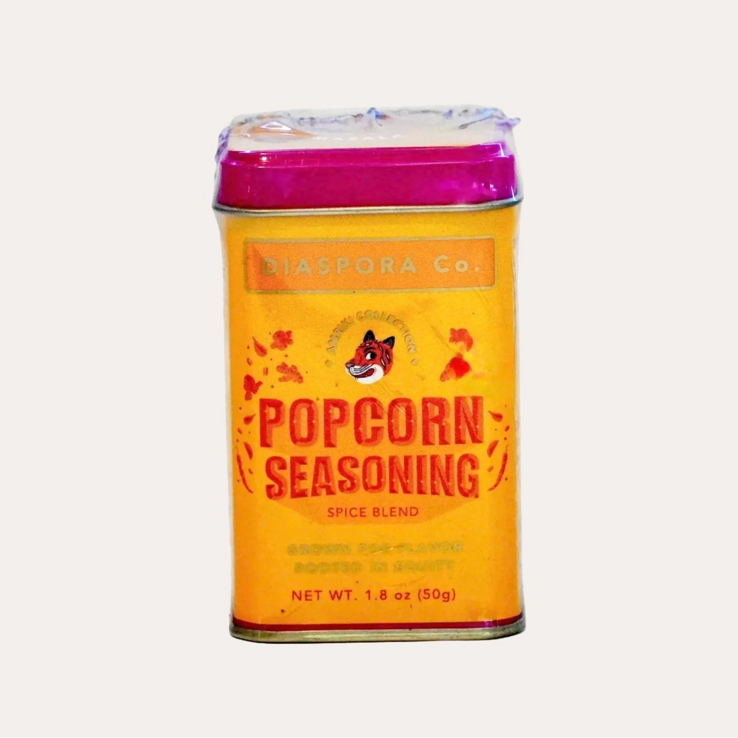 Can of popcorn seasoning with a colorful label on a white background