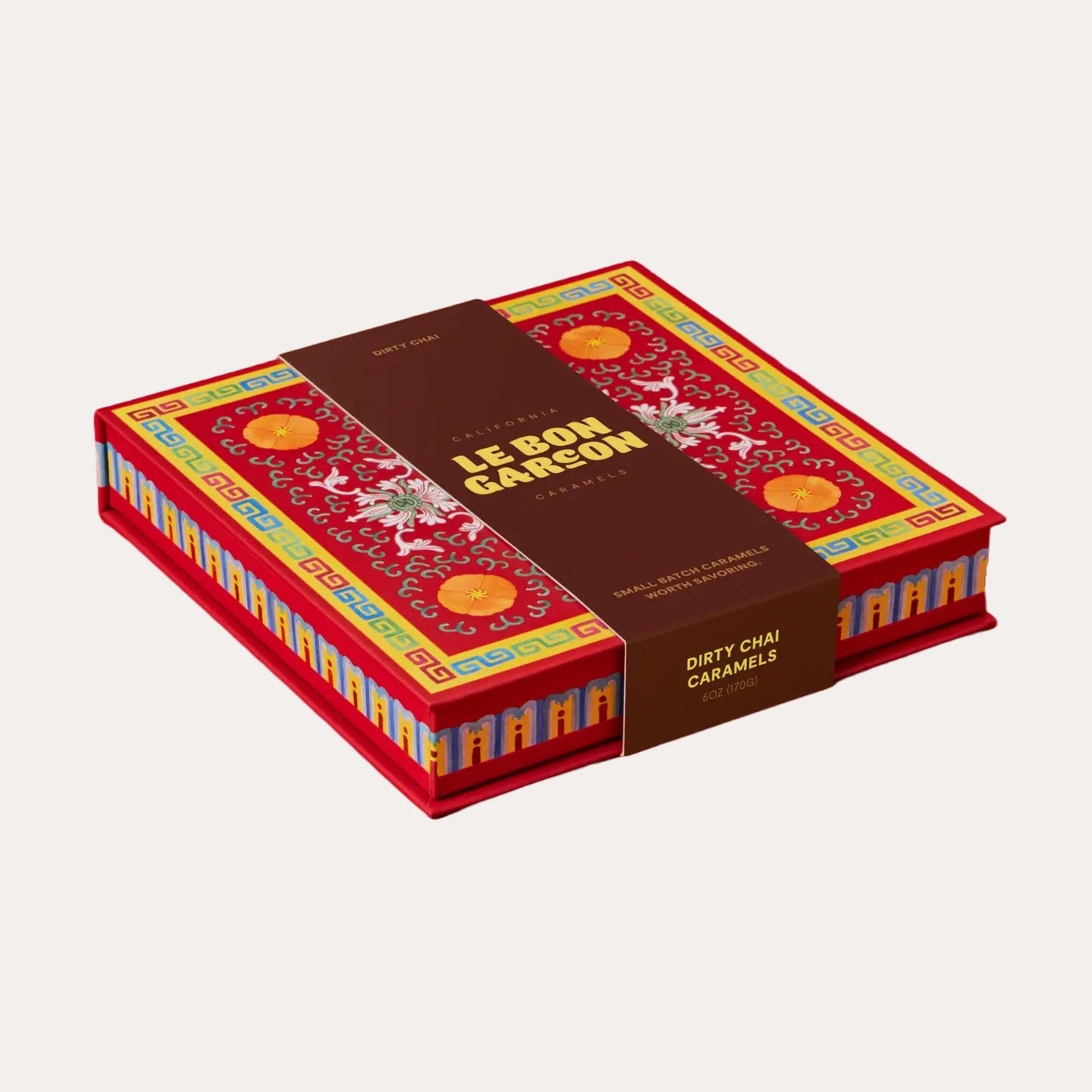Colorful box of Le Bon Marchén Dirty Chai Caramels on a white background