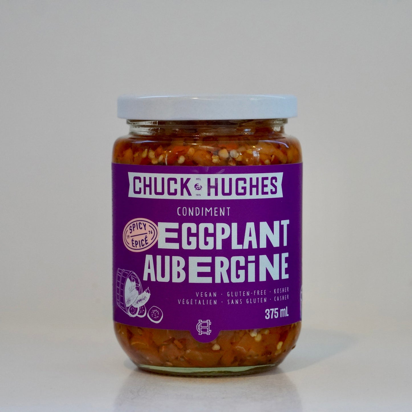 Jar of Chuck Hughes Eggplant Aubergine condiment on a white background