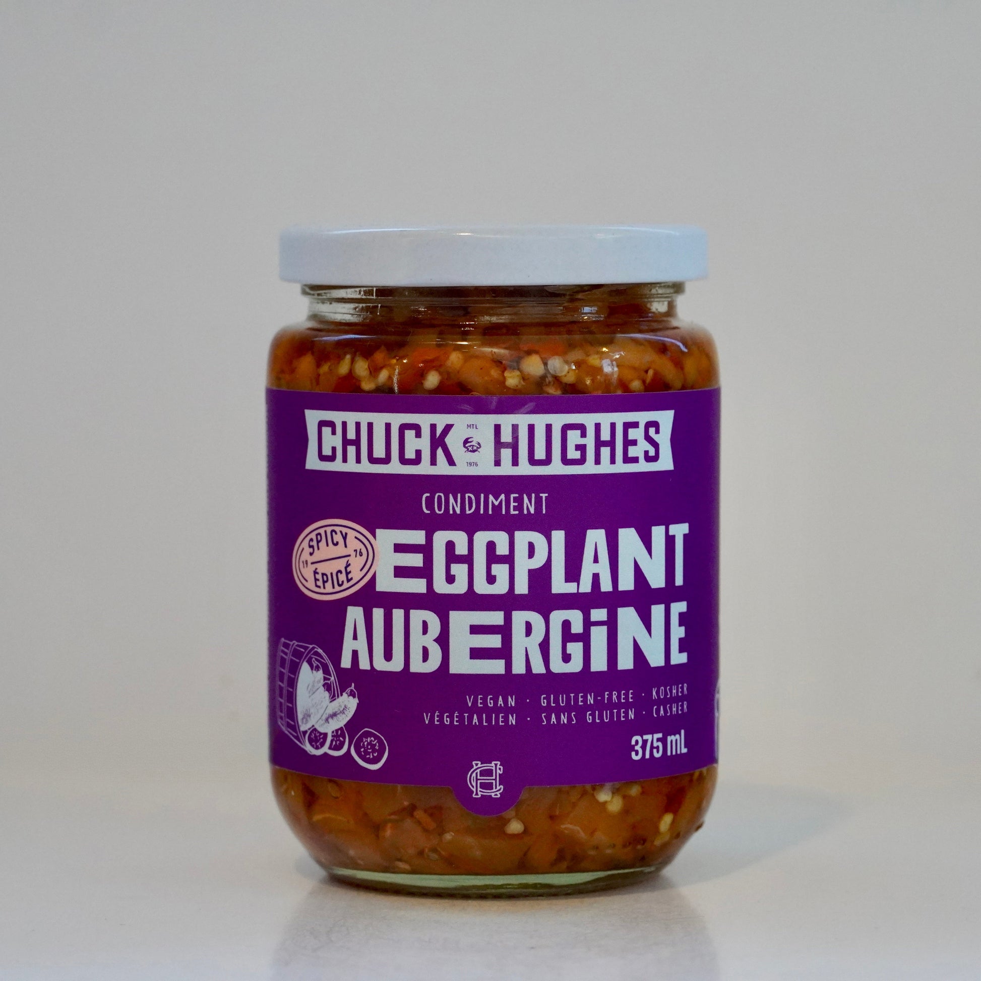 Jar of Chuck Hughes Eggplant Aubergine condiment on a white background