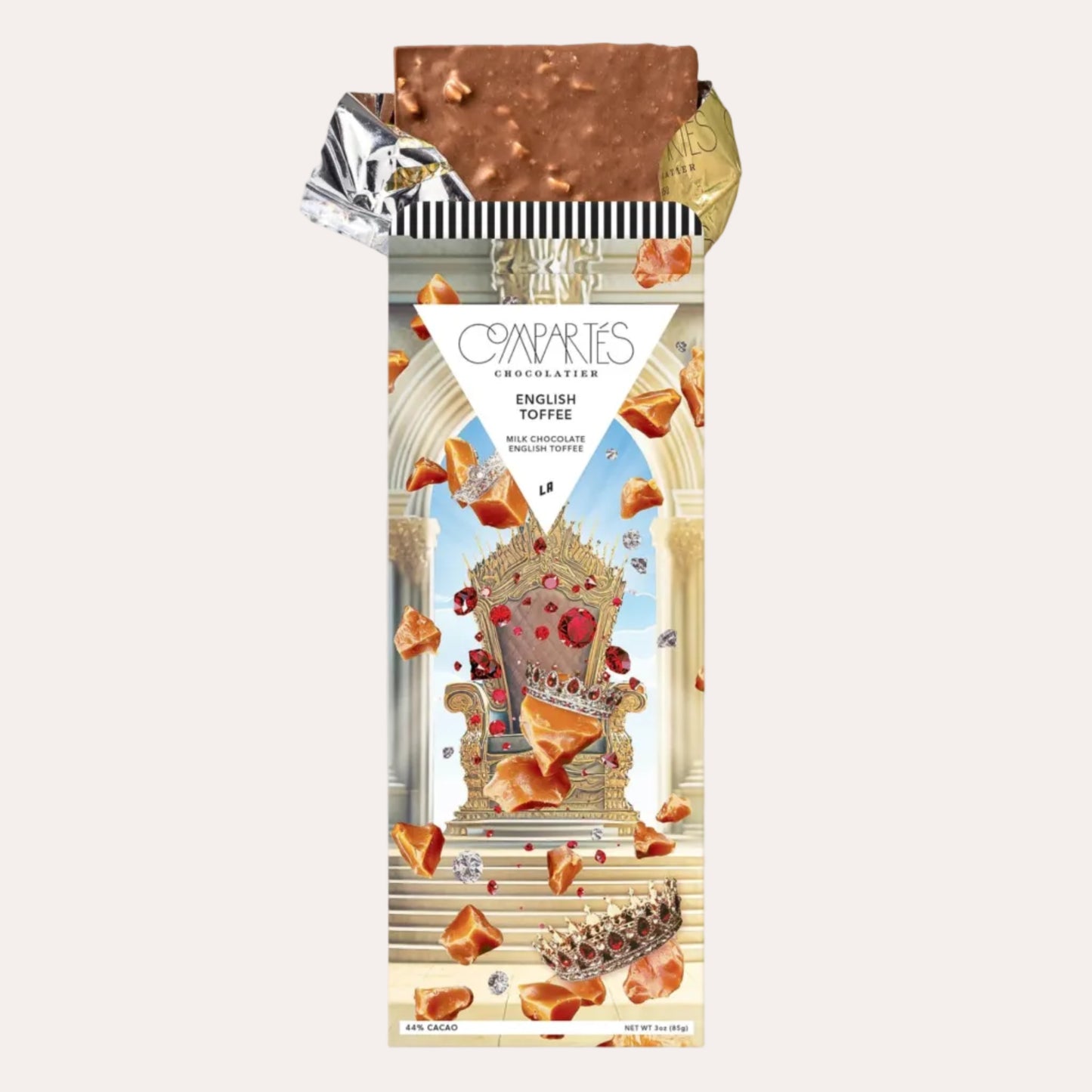 Chocolate bar with decorative packaging featuring a castle design on a white background