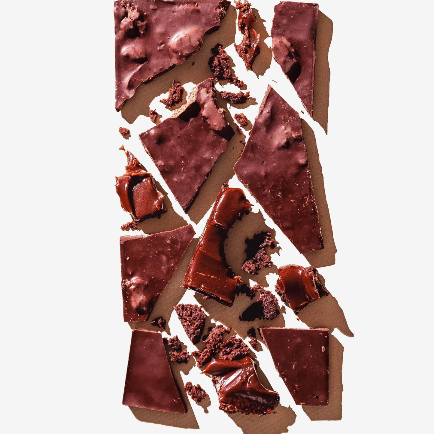 Broken pieces of chocolate on a white background