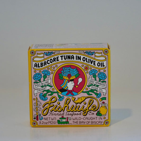 Box of Fishwife brand albacore tuna in olive oil on a white background