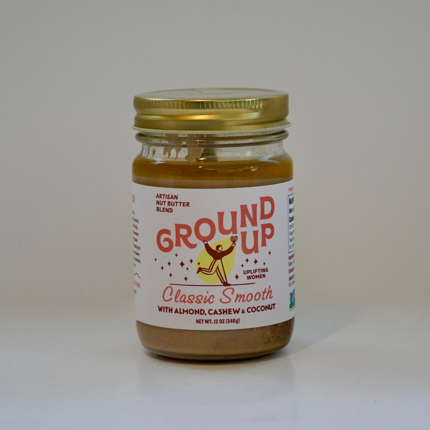 Jar of 'Ground Up' butter on a white background