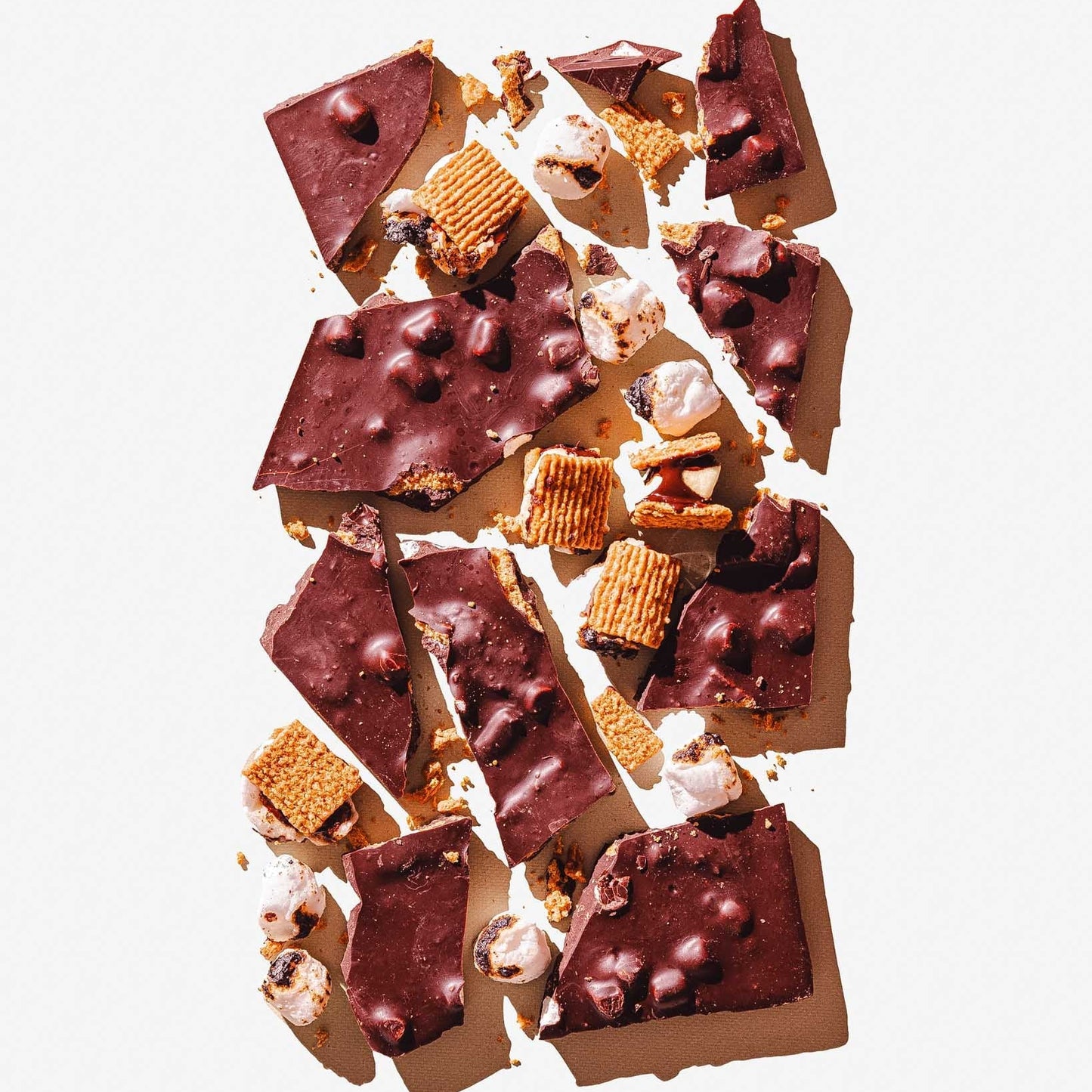 Chocolate and cookie crumb dessert on a white background