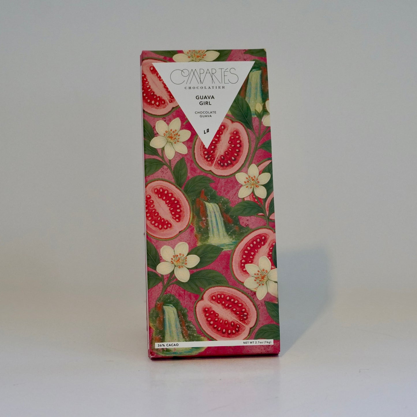 Chocolate bar packaging with pomegranate design on a white background