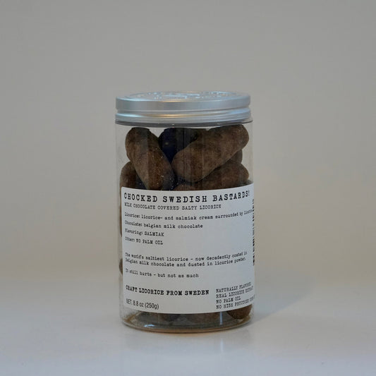 Jar of Swedish candies with a label on a white background
