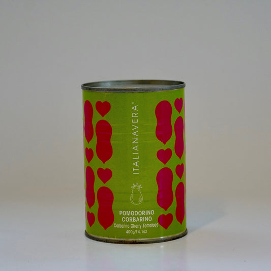 Green can with red heart patterns and 'ItalianaVera' branding on a white background