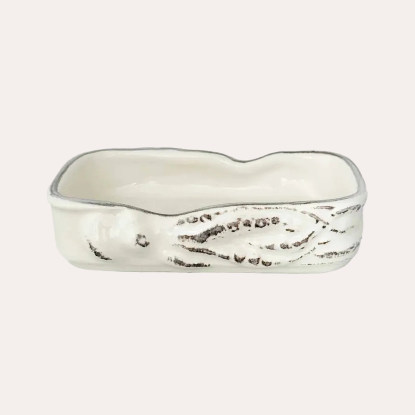 Silver ring with a textured design on a white background