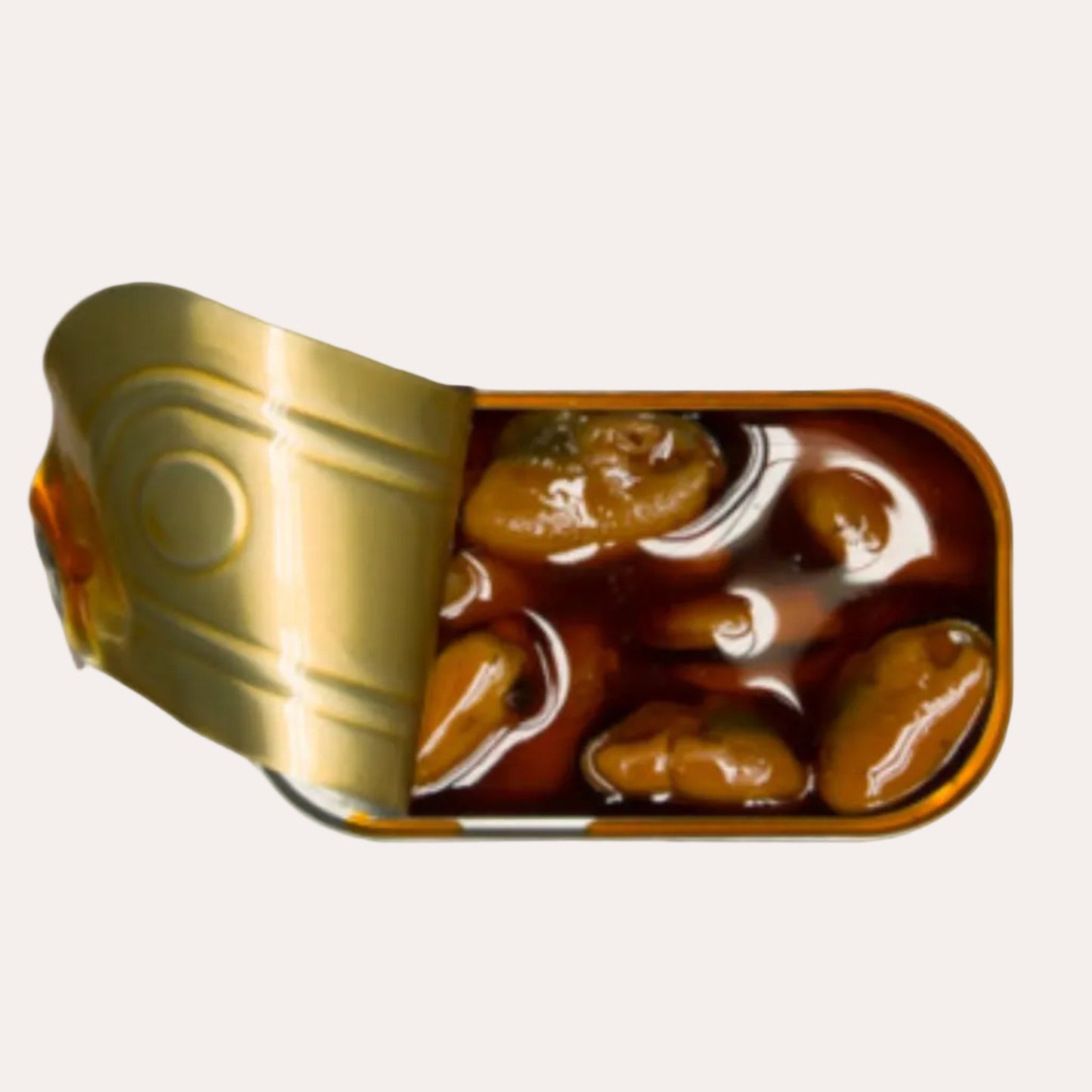 Top-down view of a can of pickled olives with a gold lid on a white background