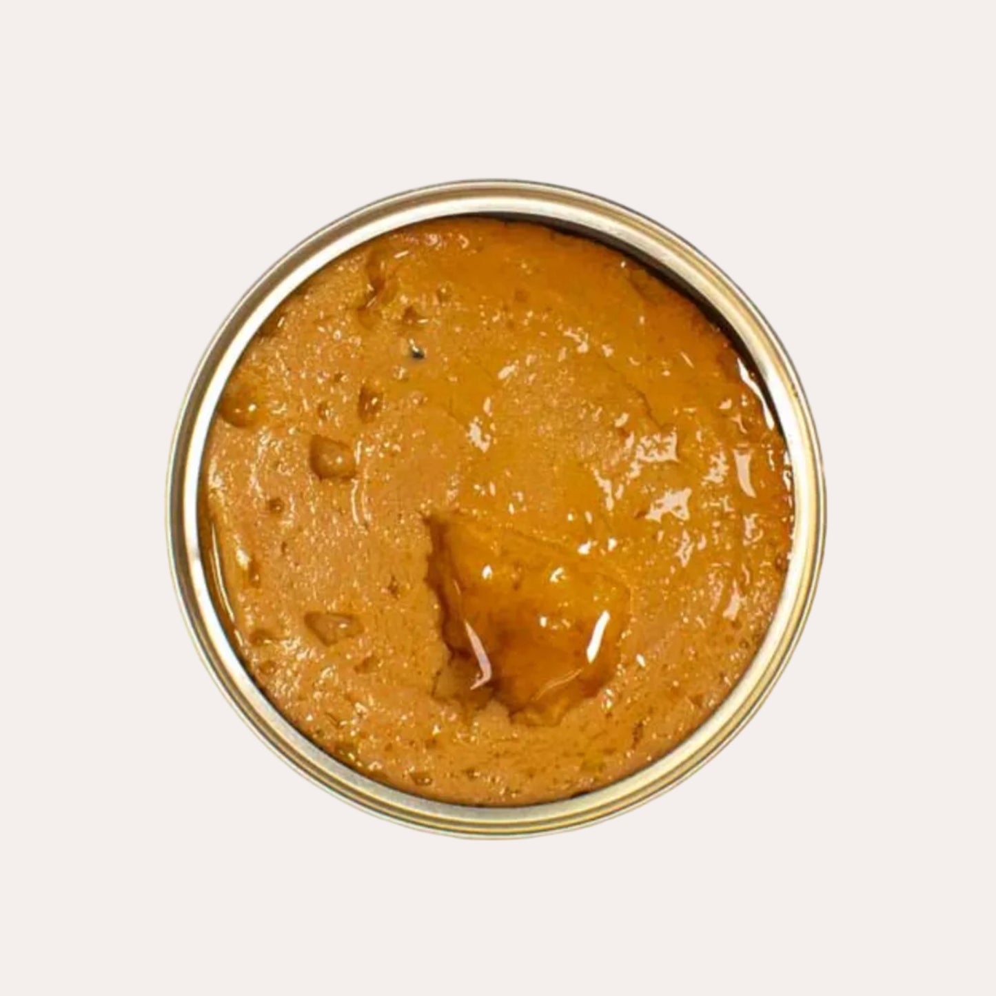 Jar of peanut butter on a white background