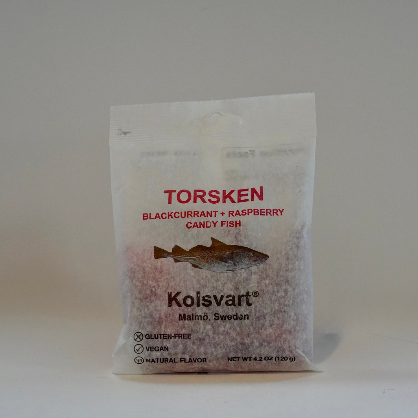 Koisvart Torsken blackcurrant raspberry candy fish packaging on a white background