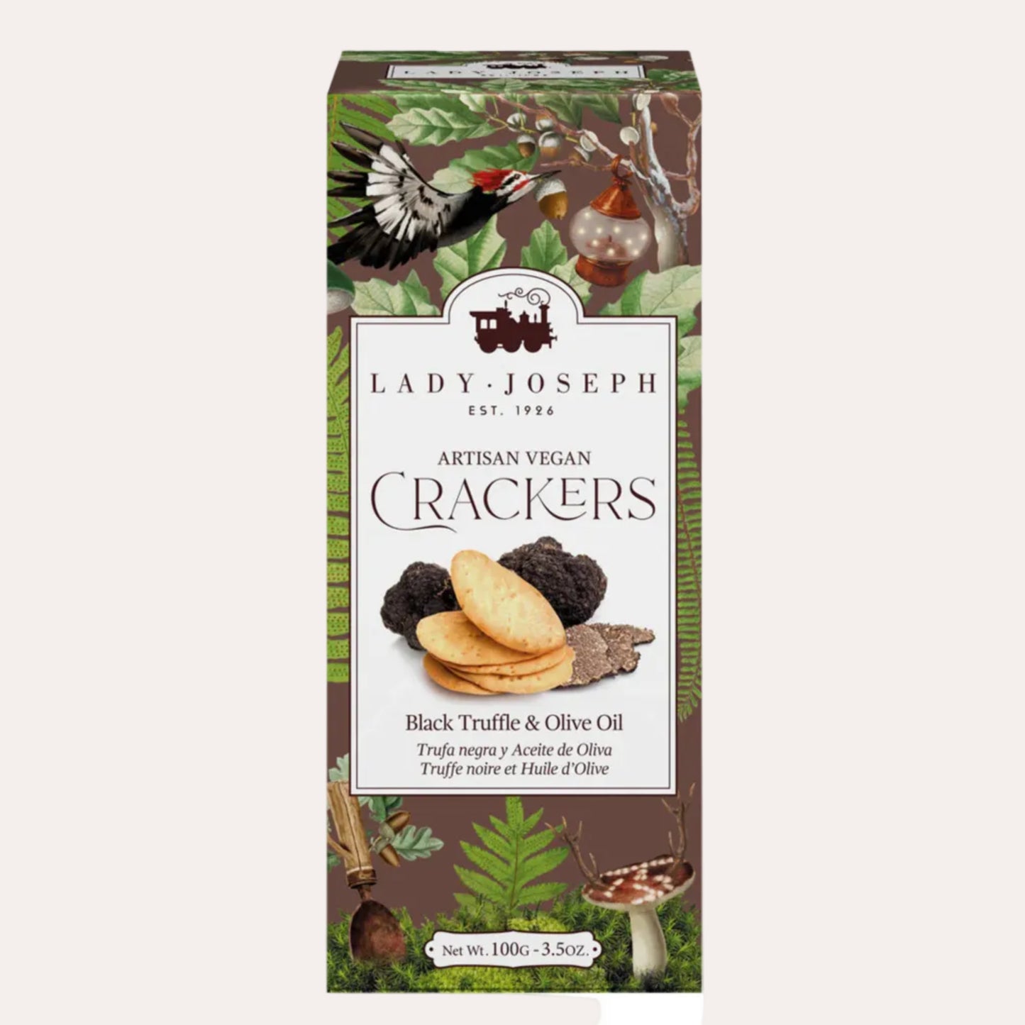 Box of Lady Joseph Artisan Vegan Crackers with black truffle and olive oil flavor on a white background