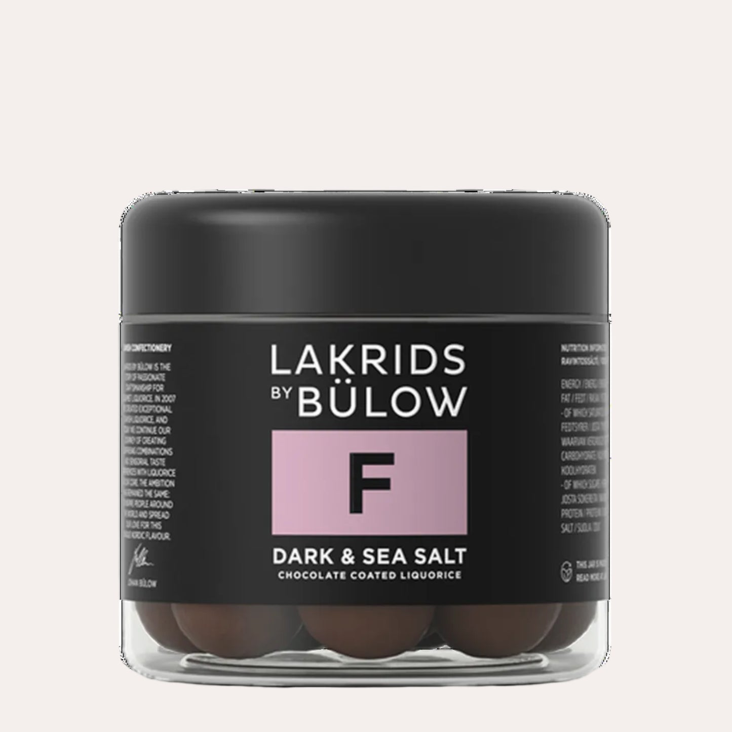 Jar of Lakrids by Bulow dark and sea salt chocolate coated liquorice on a white background