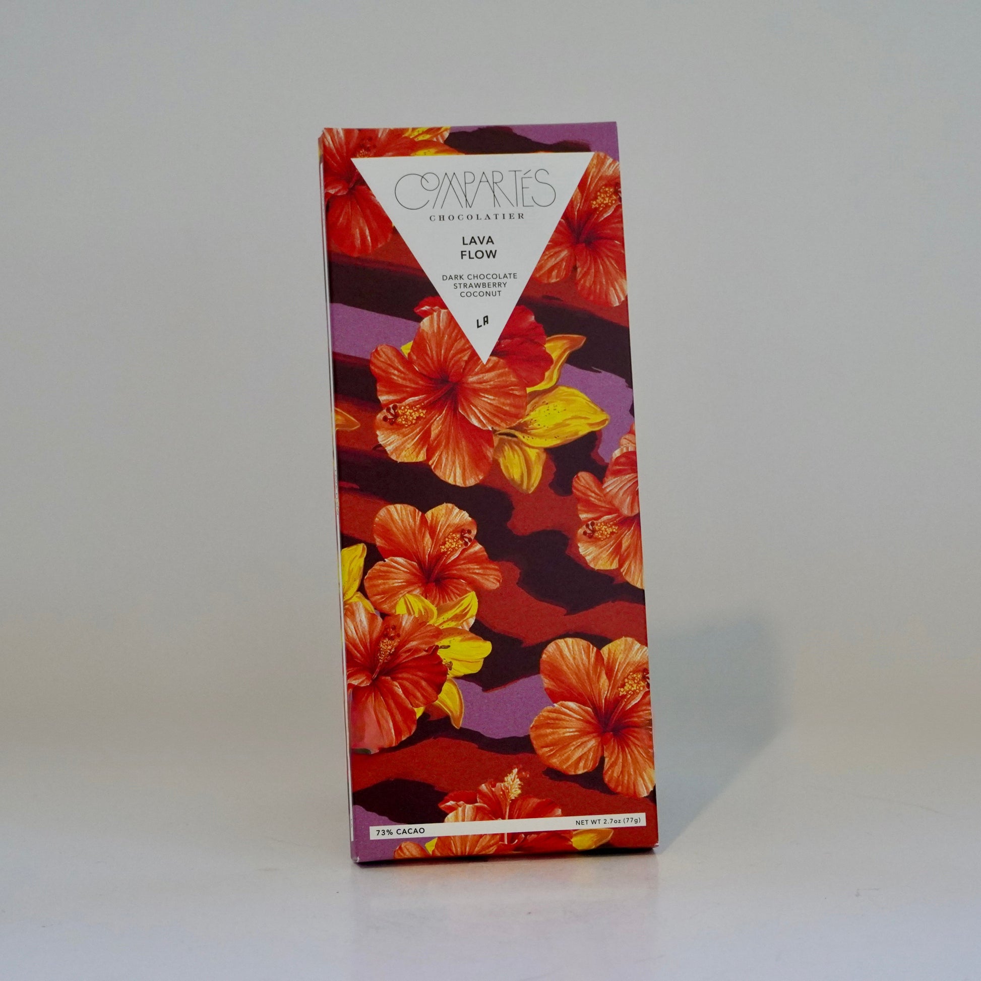 Colorful floral-patterned product box on a white background