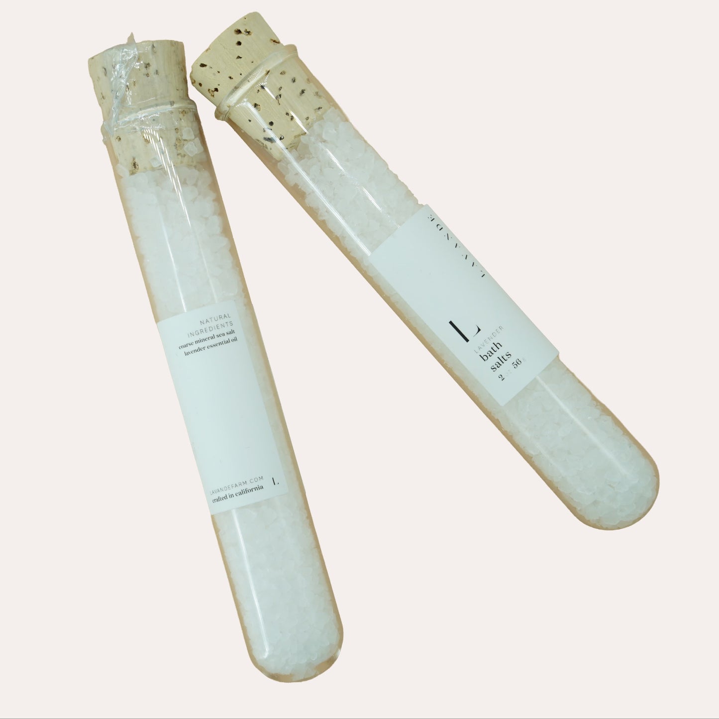 Two cylindrical glass tubes with all natural lavender bath salts