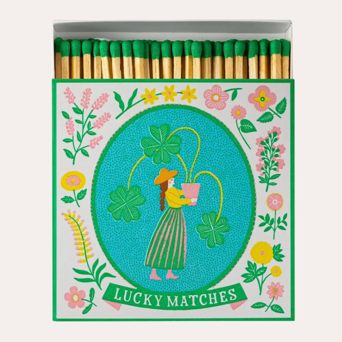 Matches with decorative packaging featuring a woman and flowers, labeled 'Lucky Matches'.