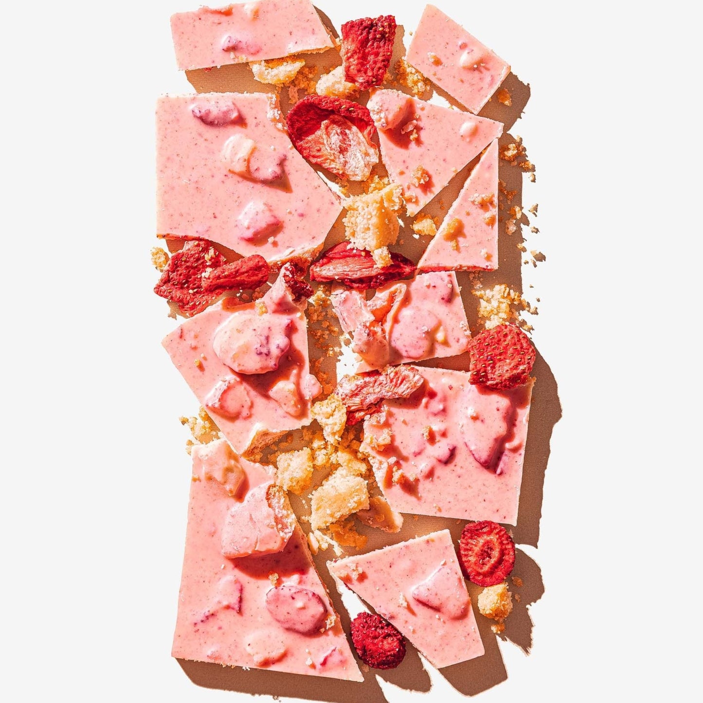 Pink dessert with raspberries on a white background