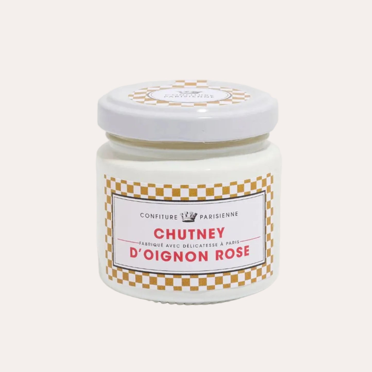 Jar of chutney with a checkered label on a white background