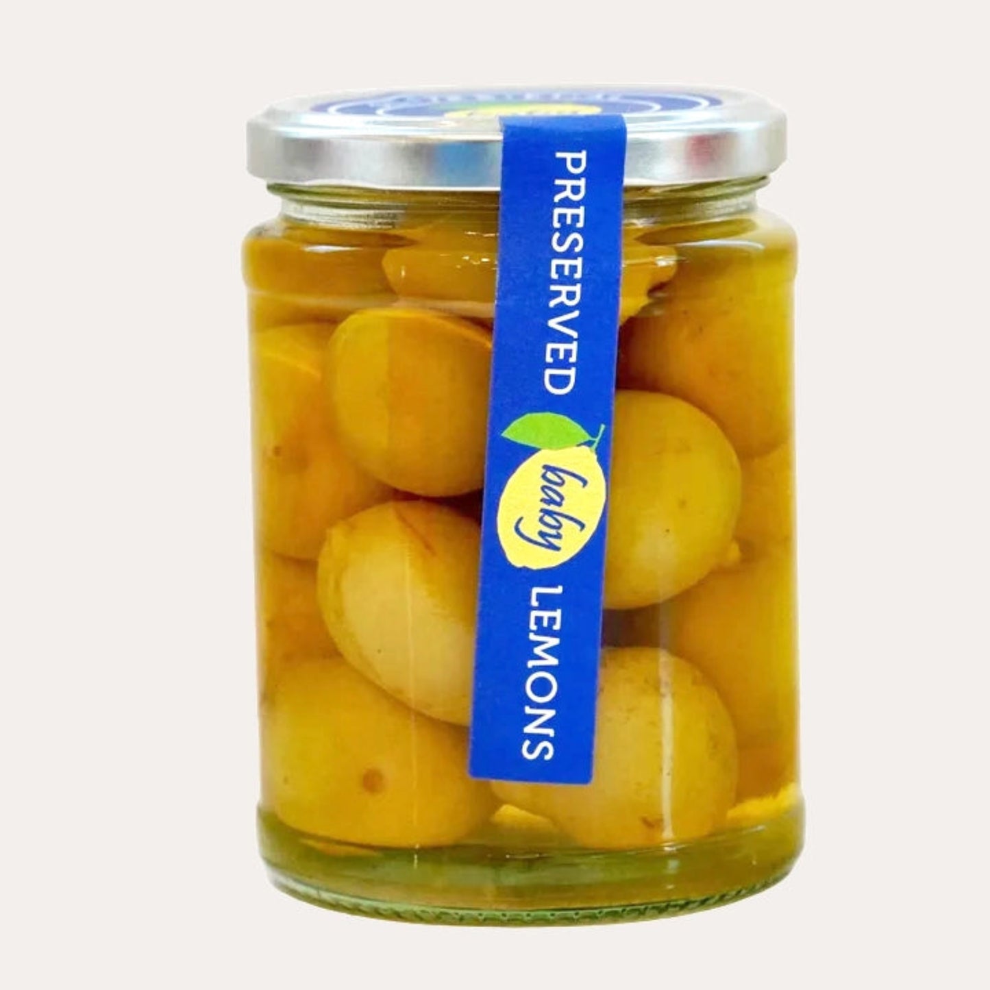 Jar of preserved baby lemons with a blue label on a white background