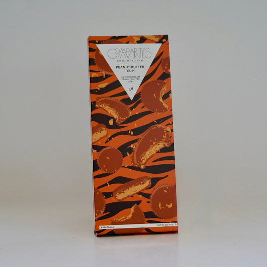 Chocolate bar packaging with a tiger stripe pattern on a white background