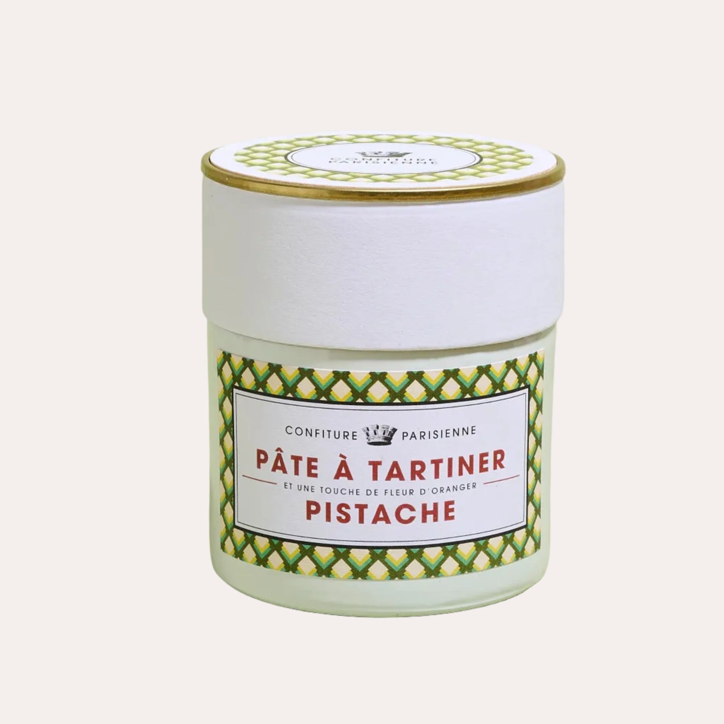 Jar of Pate a Tartiner Pistache on a light green background