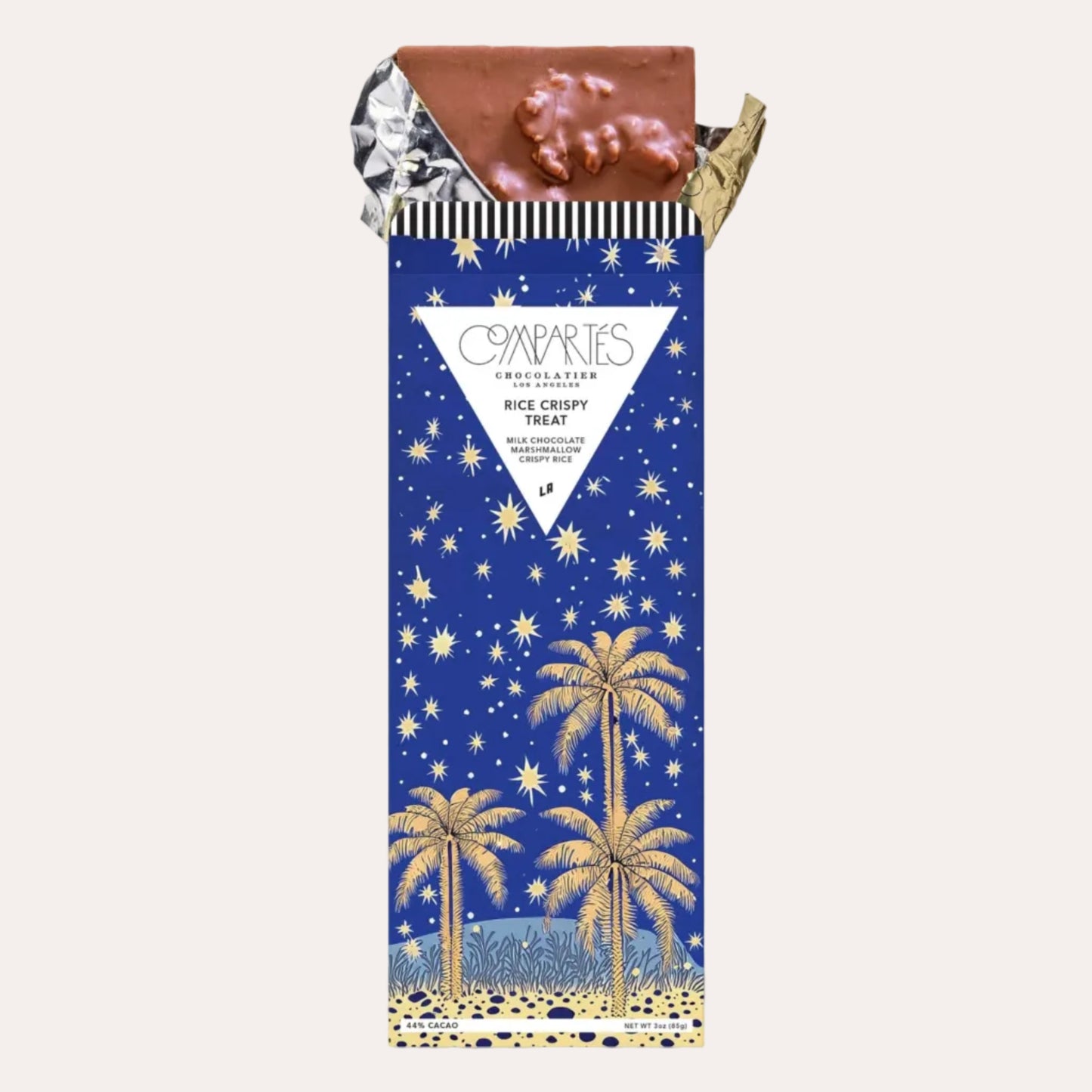 Chocolate bar with a palm tree design on the packaging against a white background