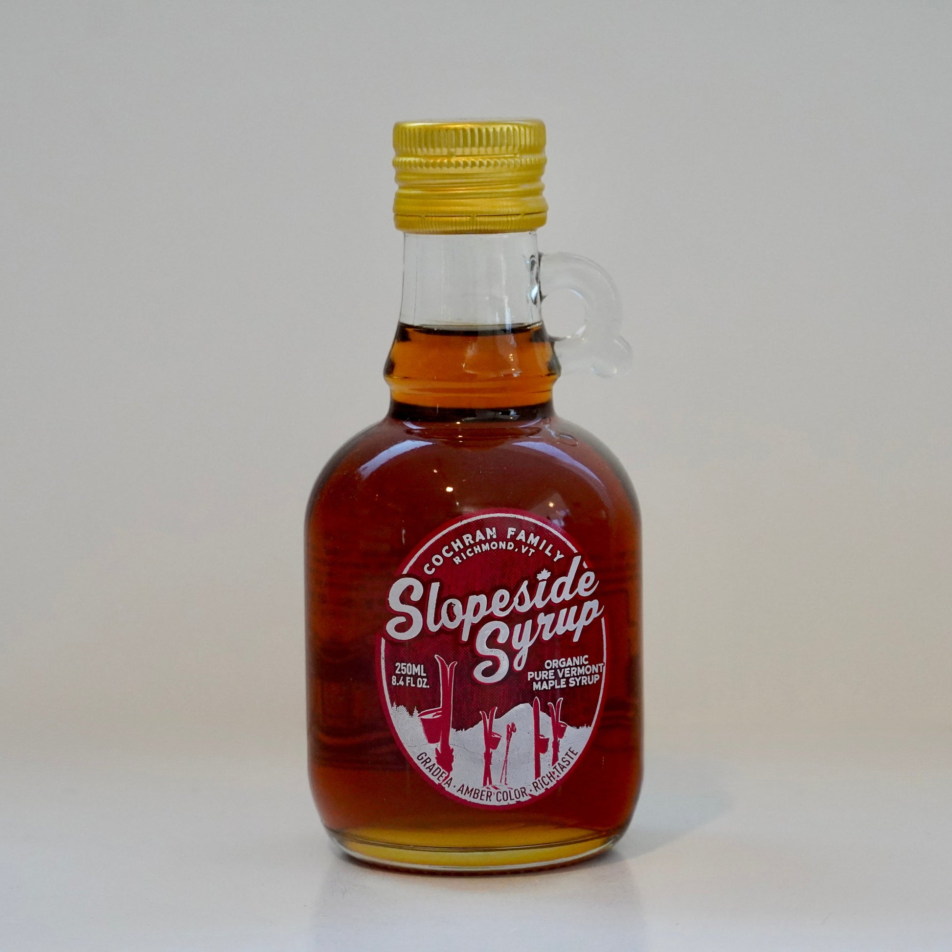 Bottle of Slopeside Syrup on a white background