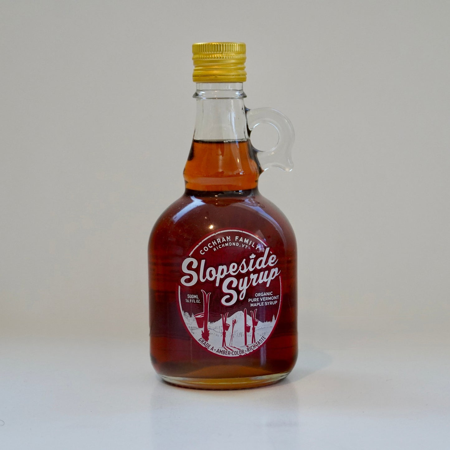 Bottle of Slopeside Syrup on a white background