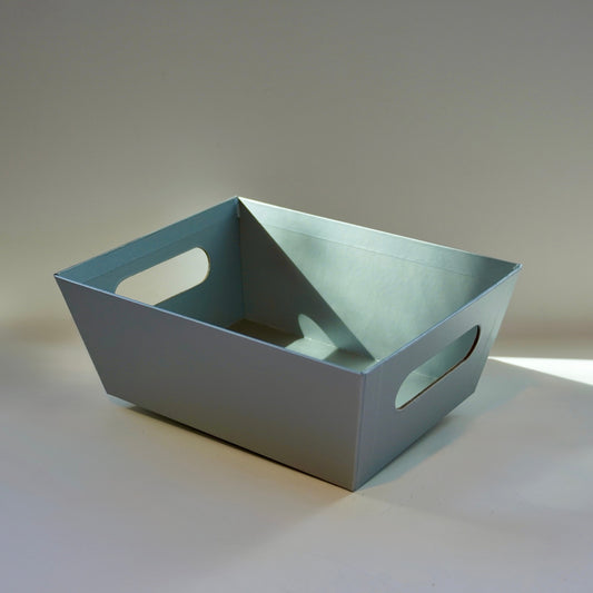 Gray rectangular tray on a light gray background