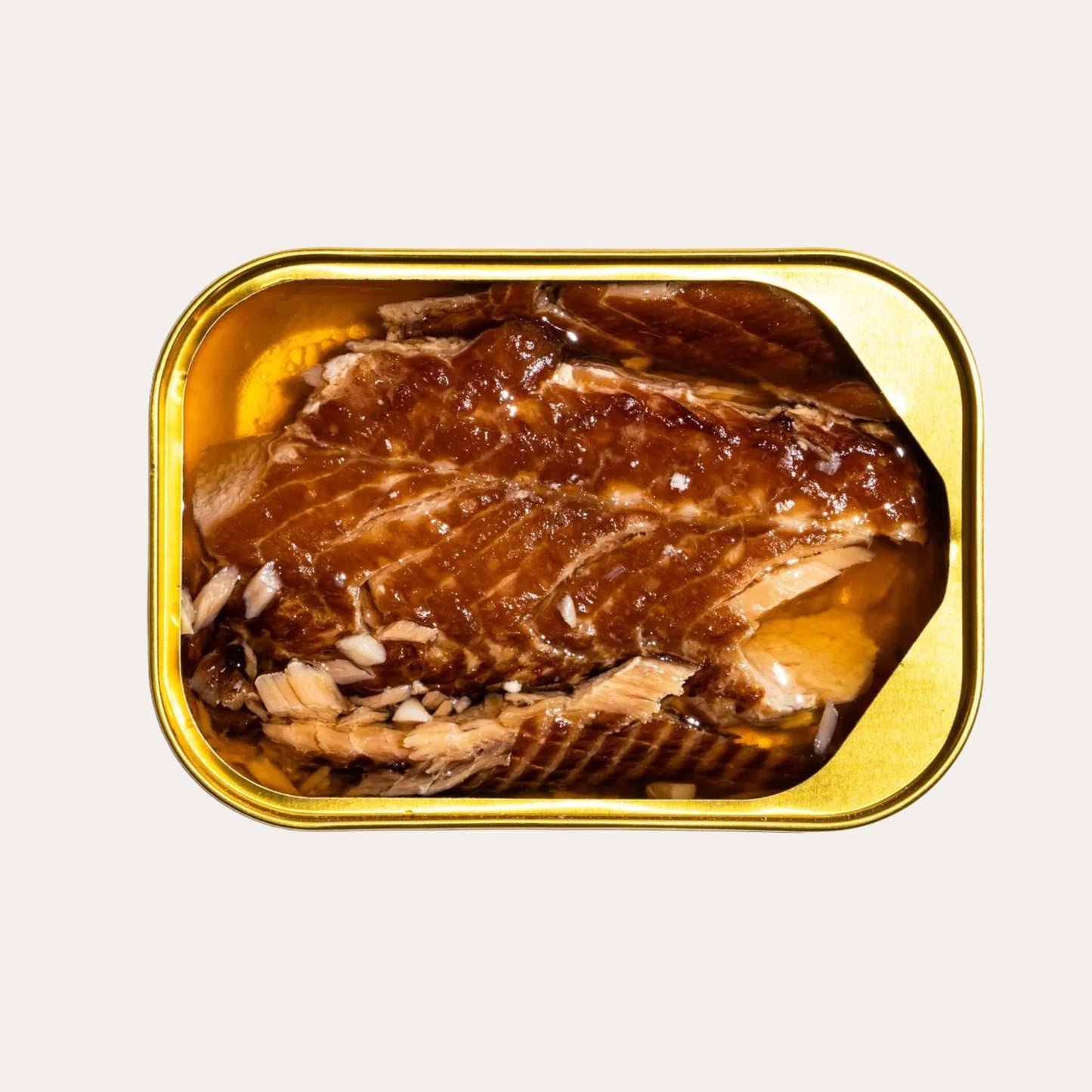 Tin of canned fish on a white background