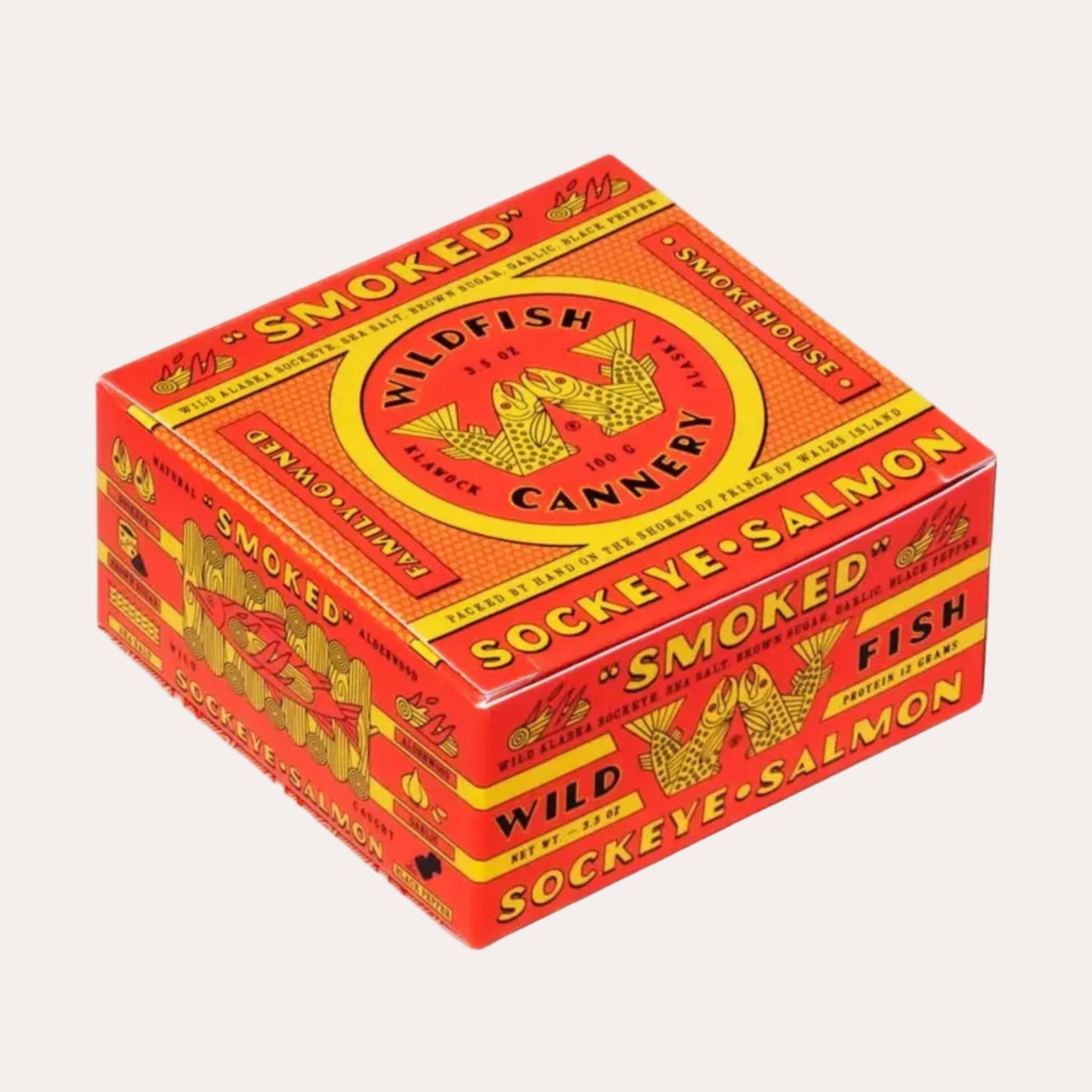 Red and yellow box of smoked sockeye salmon from Wild Fish Cannery on a white background